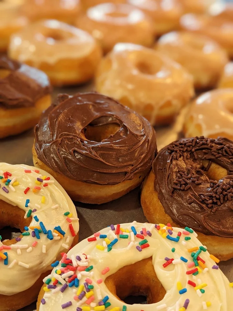 Tray of freshly frosted donuts at That Place in Lead bakery in Lead, SD