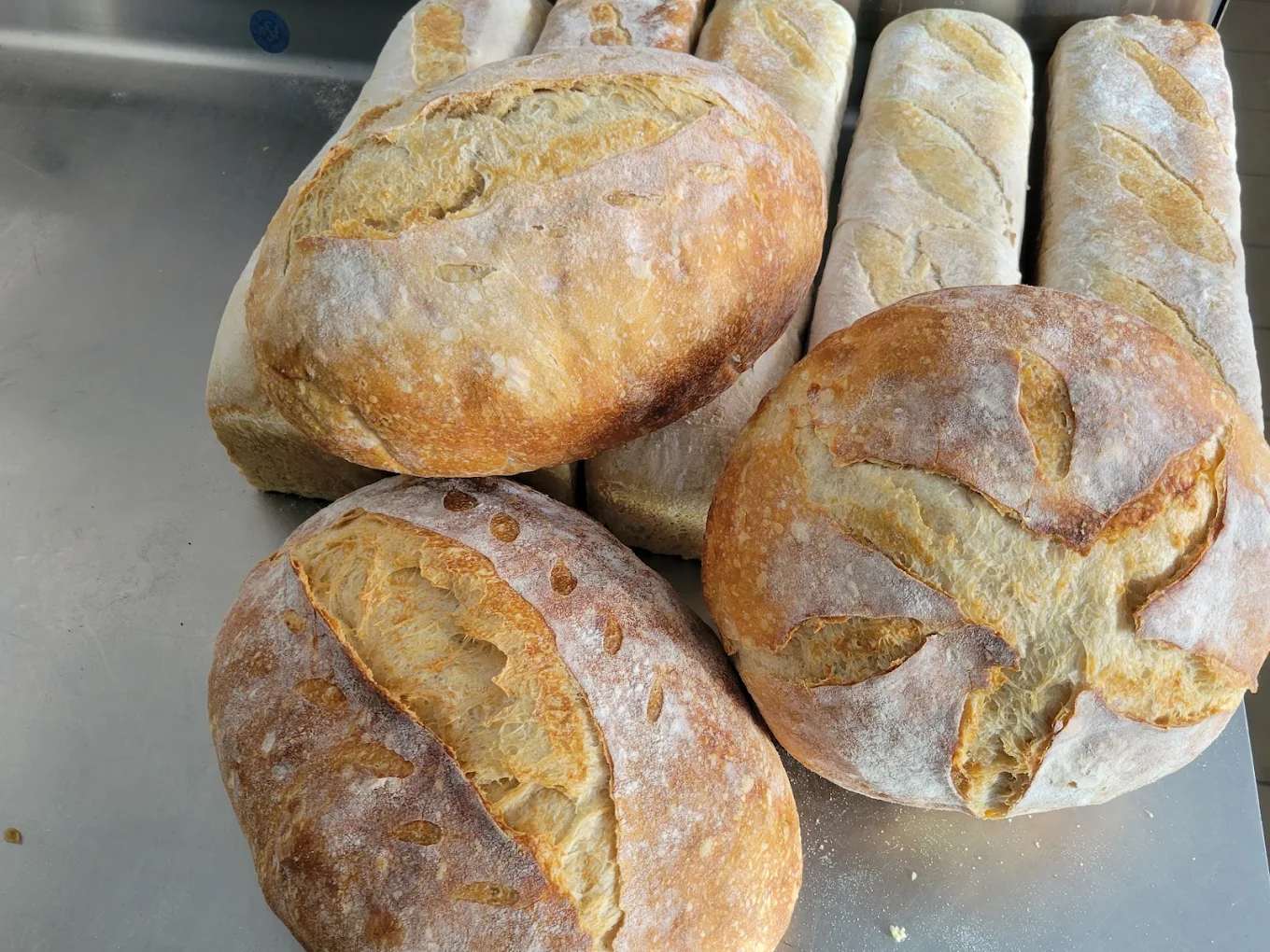 Fresh sourdough loaves and baguettes baked in Lead, SD
